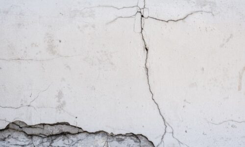Cracked wall showing heat and humidity building damage