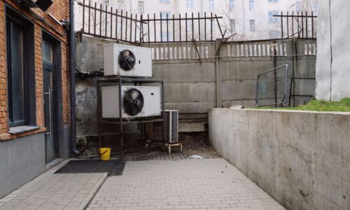 Outdoor HVAC air conditioning unit affecting indoor humidity
